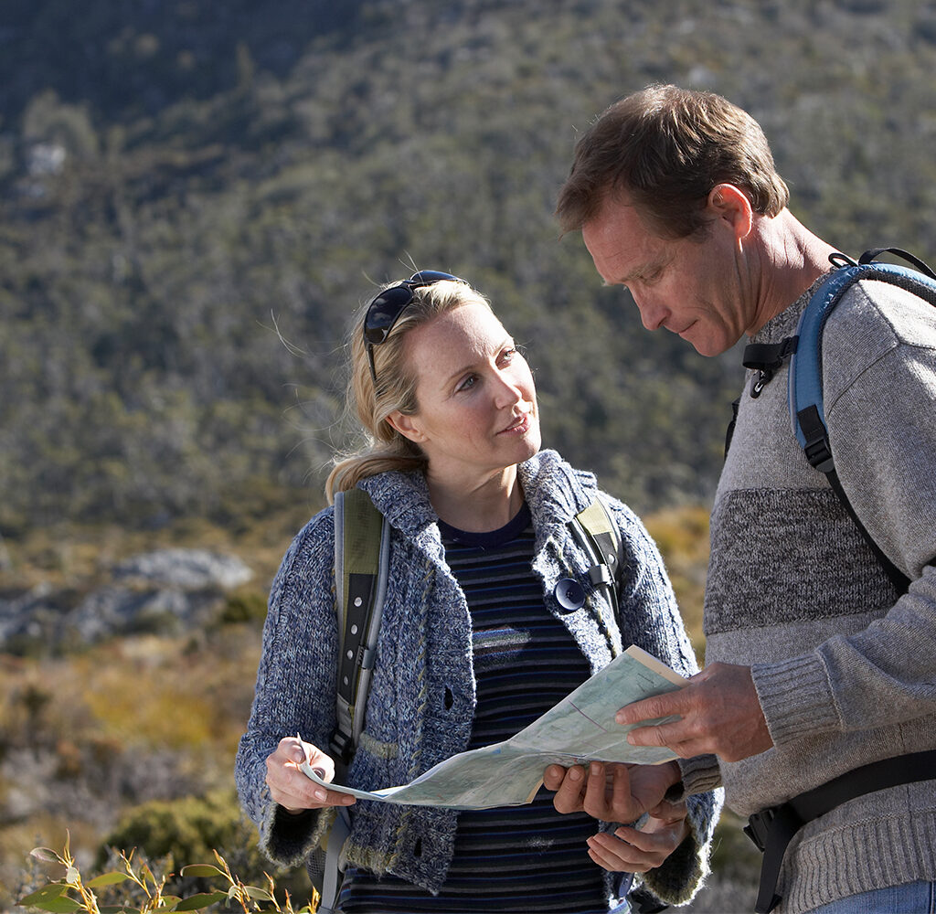 Lost hikers looking at a map.